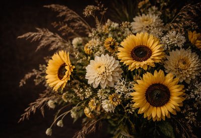 Content-Box-Fall-Flowers Sunflower and dahlia bouquet in warm golden light