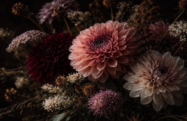 Moody autumn bouquet with dahlias and textured flowers